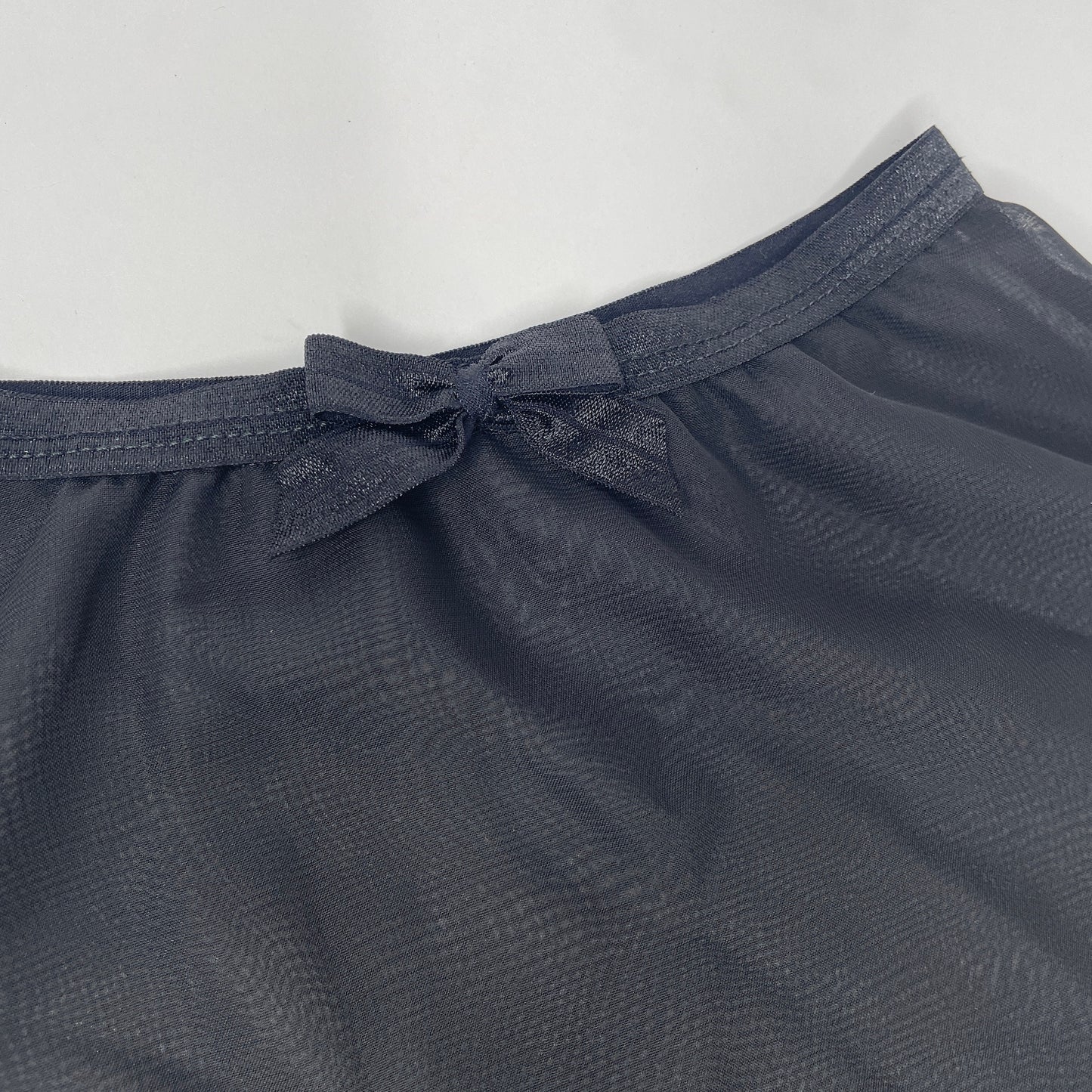 girls pull on ballet skirt