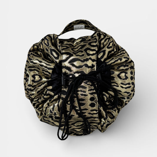 Leopard print drawstring bag on a white background