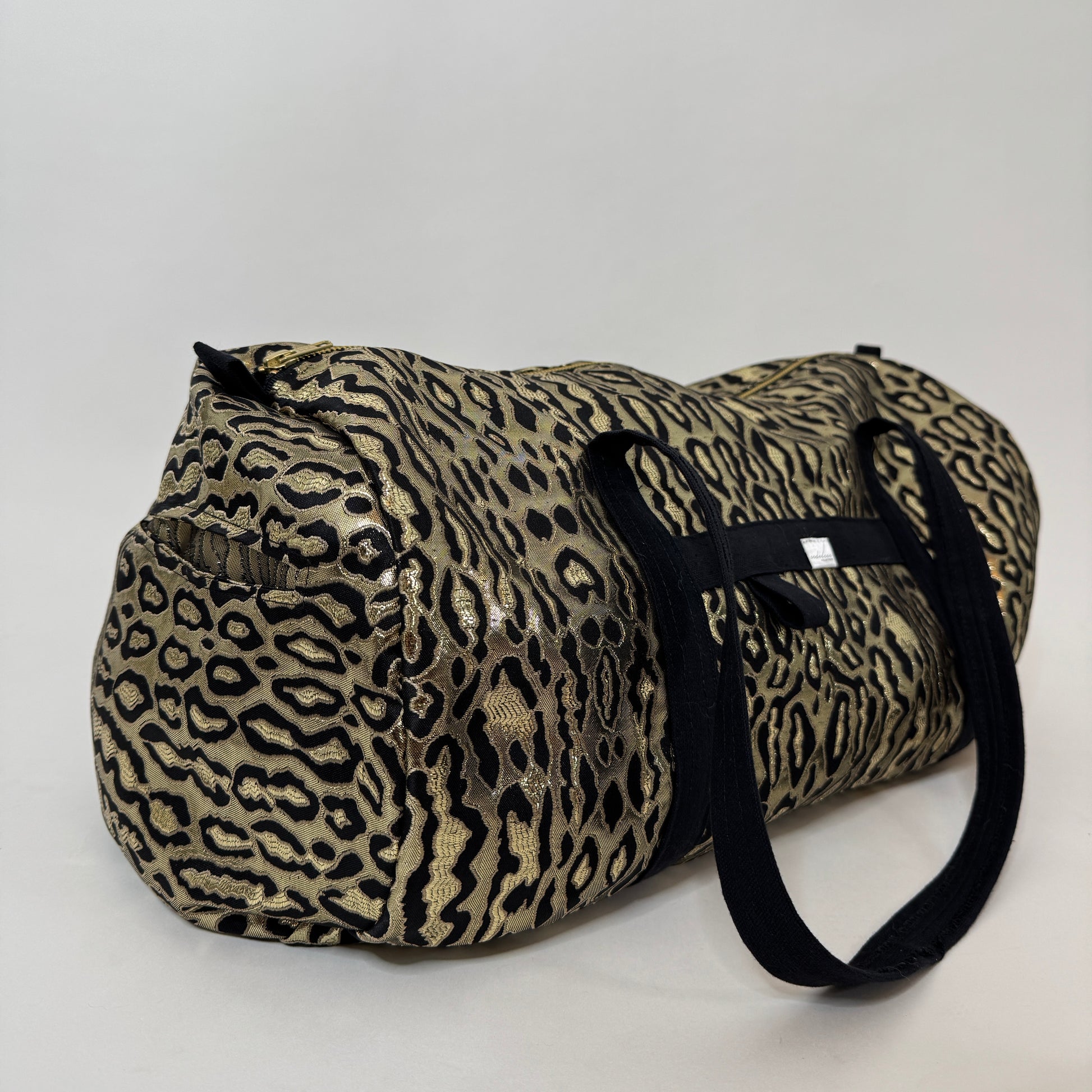 gold cheetah duffel bag